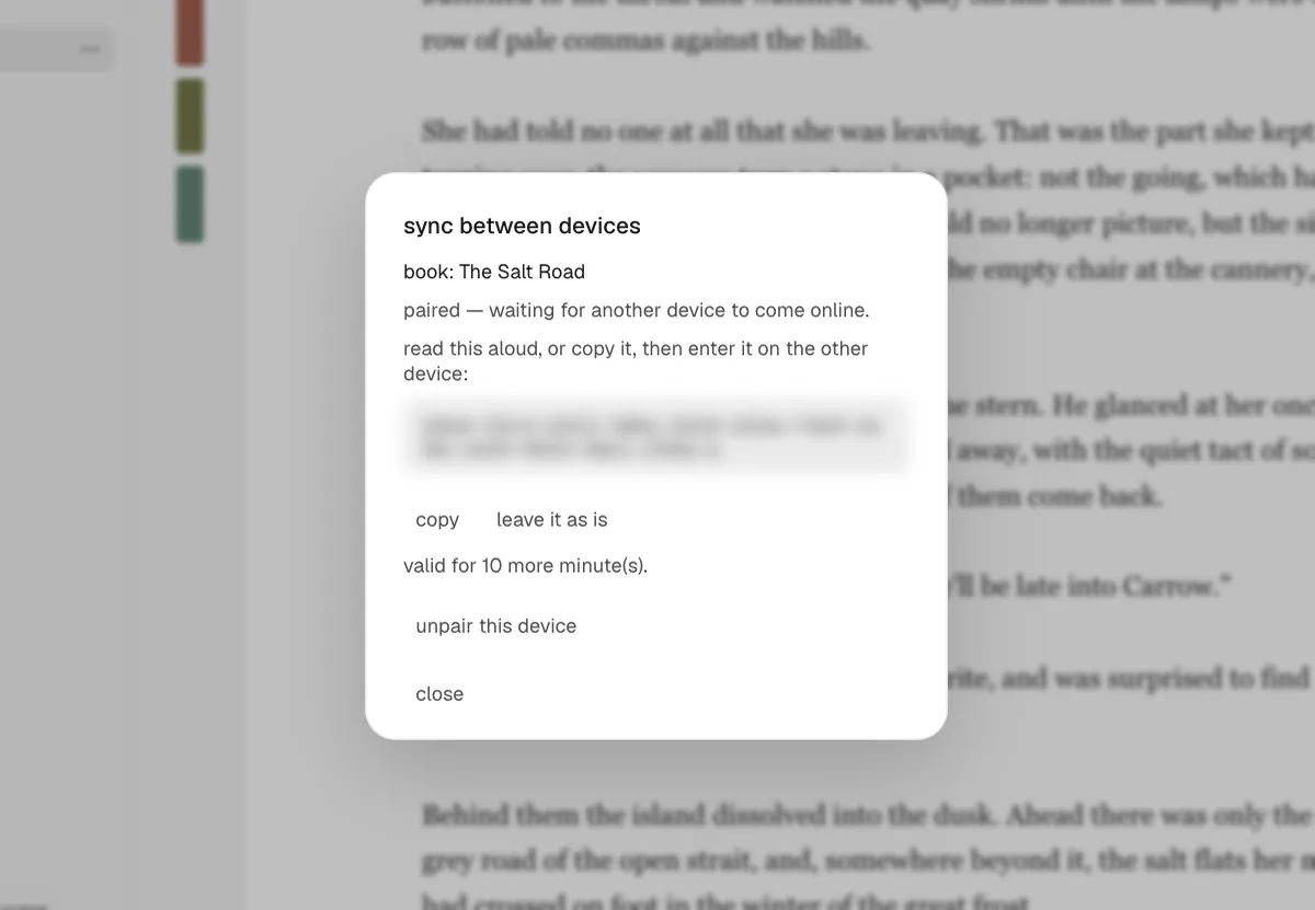 The pairing window with its code, blurred in this picture.